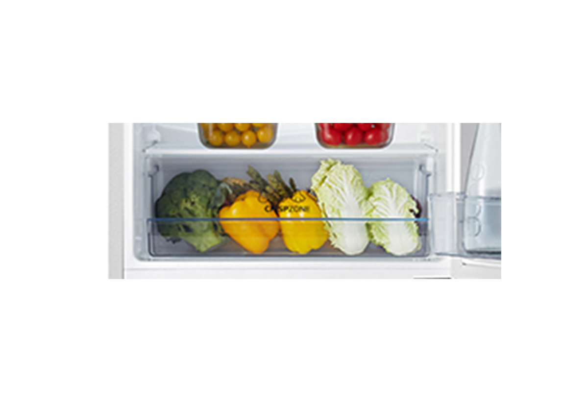 Απεικονίζεται κοντινό στο ειδικό συρτάρι για τα φρούτα και τα λαχανικά.